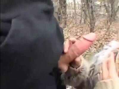 Girl in fur coat give blowjob in forest - nvdvid.com