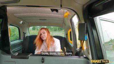 Big-titted Redhead gets her natural tits and ass drilled in a fake taxi ride - sexu.com - Usa