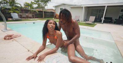 Aroused ebony goes very loud during outdoor pool porno with her new BF - alphaporno.com